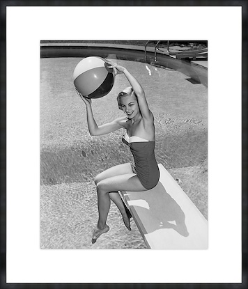 30 x 35 High Angle View of Young Woman Sitting on Diving Board Throwing Beach Ba (GF)