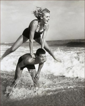 40 x 50 Young Couple Playing Leapfrog in Surf (FC)